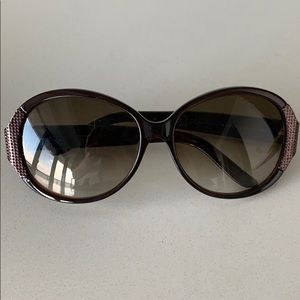 Yve Saint Laurent sunglasses.